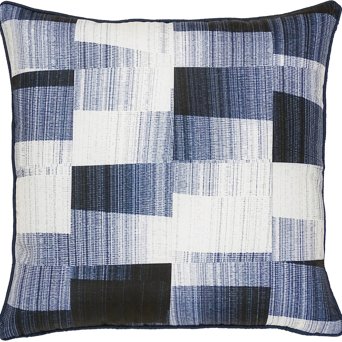 Miltone Outdoor Pillow featuring a geometric patchwork design in navy blue, white, and black colors, made from textured fabric.