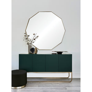 Cruz Wall Mirror displayed above a modern green console table with decorative elements.