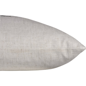 Another side view of Knot Indoor Pillow highlighting its sleek beige design