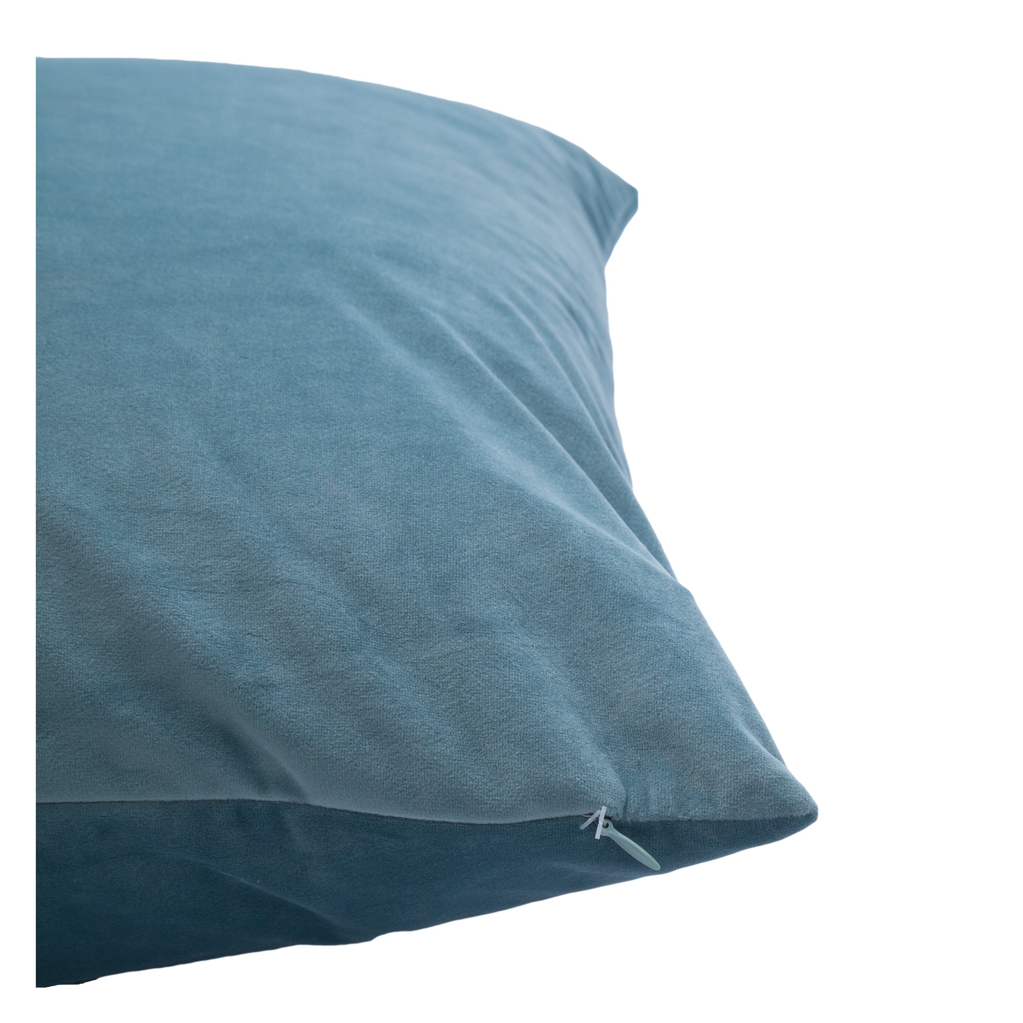 Warrington indoor pillow in blue velvet, close-up showing zipper detail.