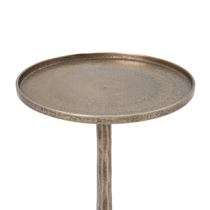 Dunn Side Table featuring a close-up of the round metallic top with a textured finish.