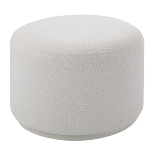 Audrina Ottoman featuring a plush white fabric, round design, close-up view
