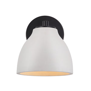 Lena Wall Sconce showcasing a white shade and black base from a top view.