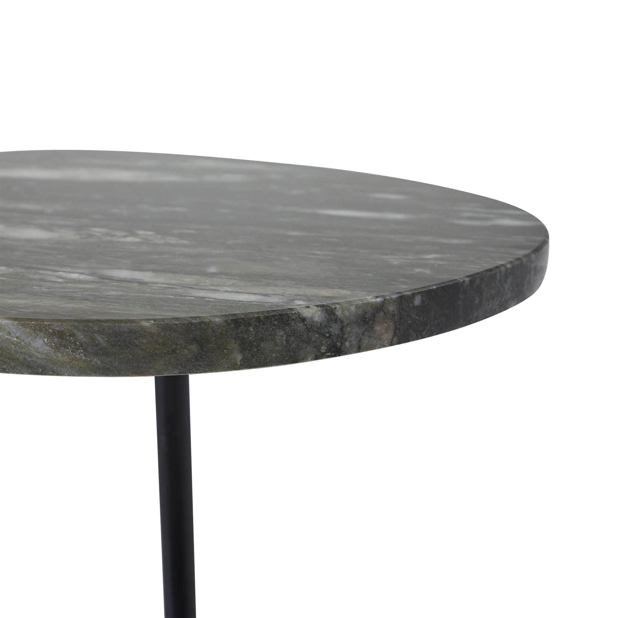 Close-up of Adeline Side Table's black marble surface showcasing its texture and color variations.