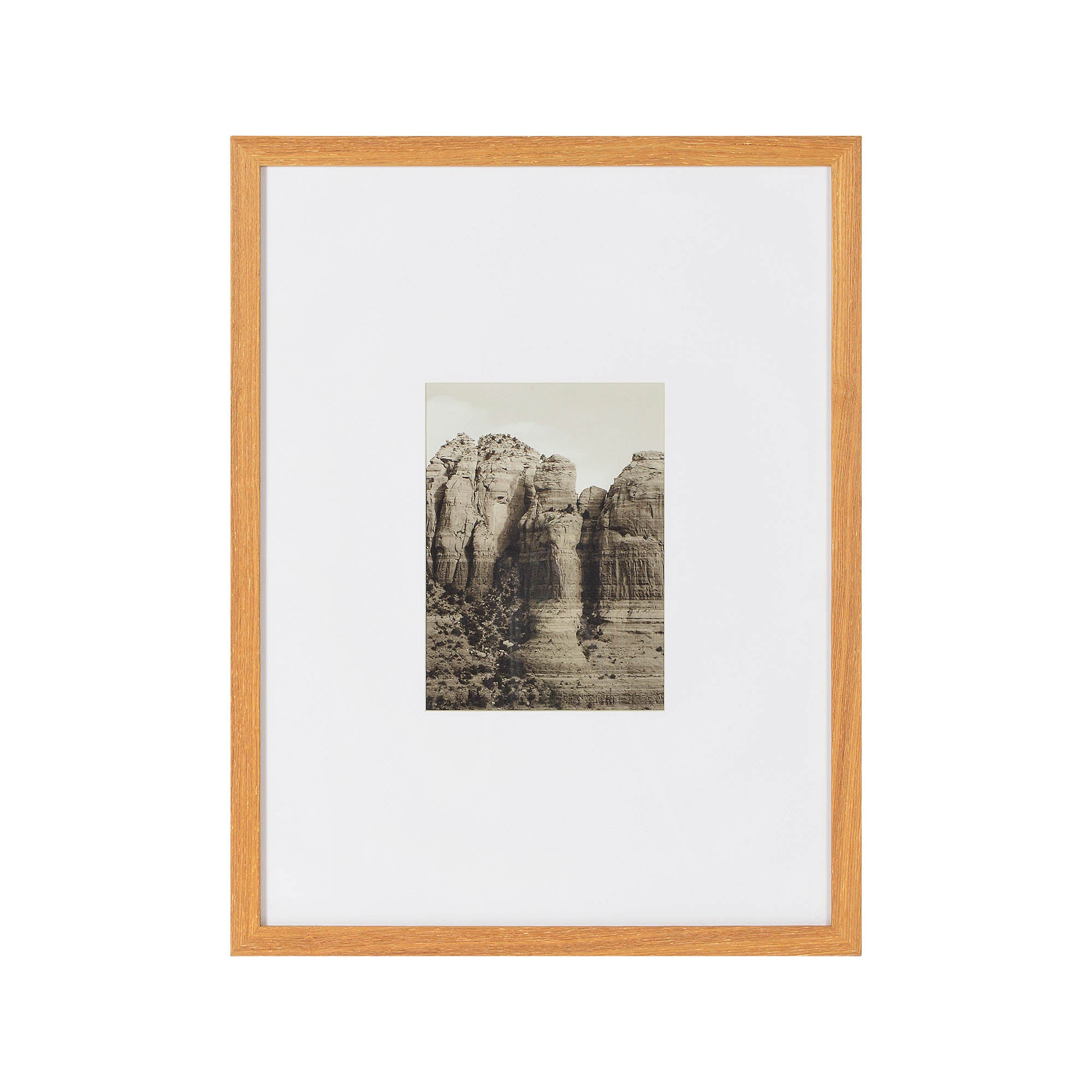Torreys Wall Art featuring a framed black and white image of rocky cliffs with a wooden frame.