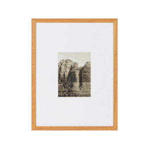 Torreys Wall Art featuring a framed black and white image of rocky cliffs with a wooden frame.