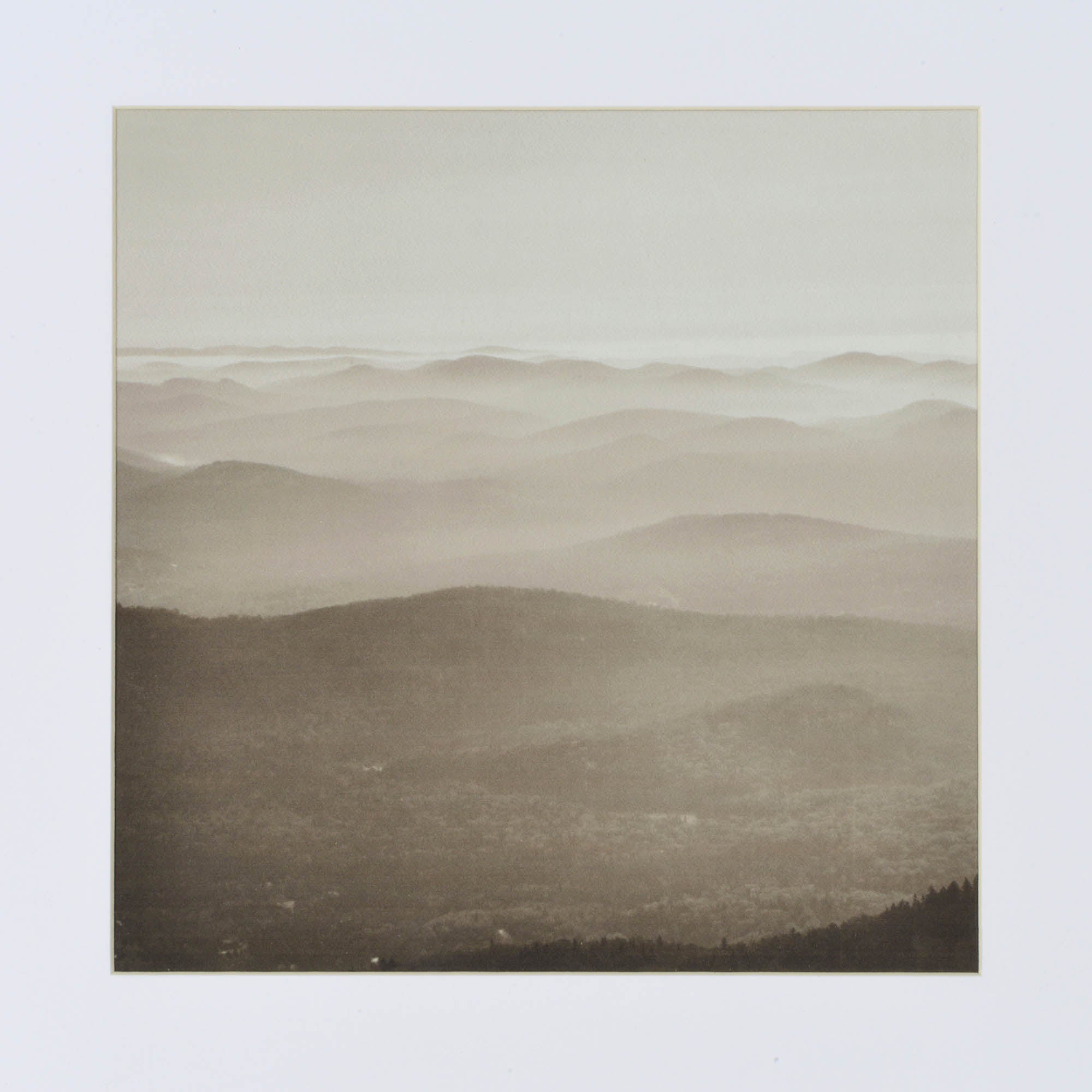 Torreys Wall Art illustrating a misty mountain view in a white frame