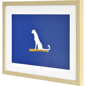 Makalu Wall Art close-up of a white dog silhouette on a blue background with a gold accent