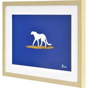 Makalu Wall Art showcasing a walking white dog silhouette on a blue background with gold details
