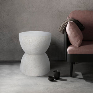 Chayton Side Table styled beside a sofa, featuring a textured white design and modern decor.