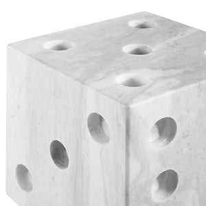Dylon statue, close-up of white marble cube with holes, contemporary look
