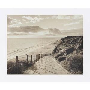 Torreys Wall Art featuring a sepia-toned beach path leading to the ocean in a white frame