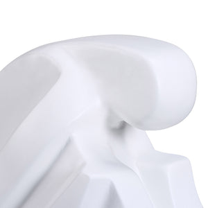 Close-up of Imagine Statue by Renwil, emphasizing the smooth white surface and rounded features.