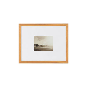 Torreys Wall Art featuring a sepia-toned beach landscape in a light wood frame